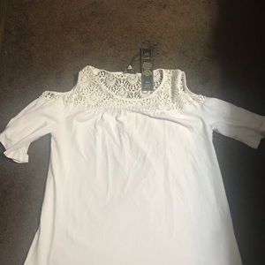 Medium white blouse NWT with shoulder cut out